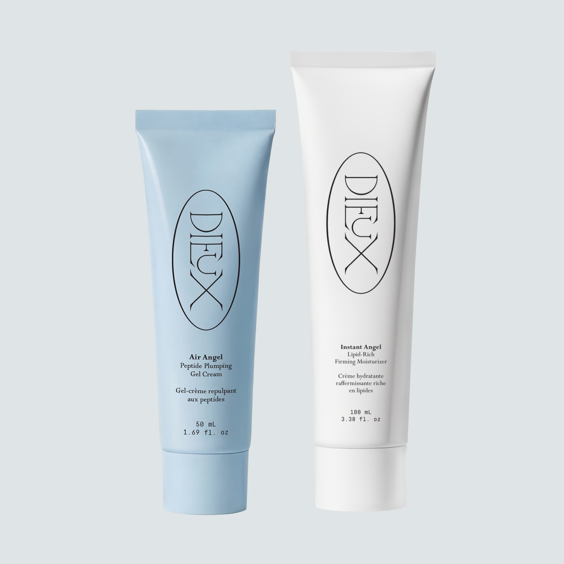 Dieux Air Angel and Instant Angel moisturizer tubes on a pale background