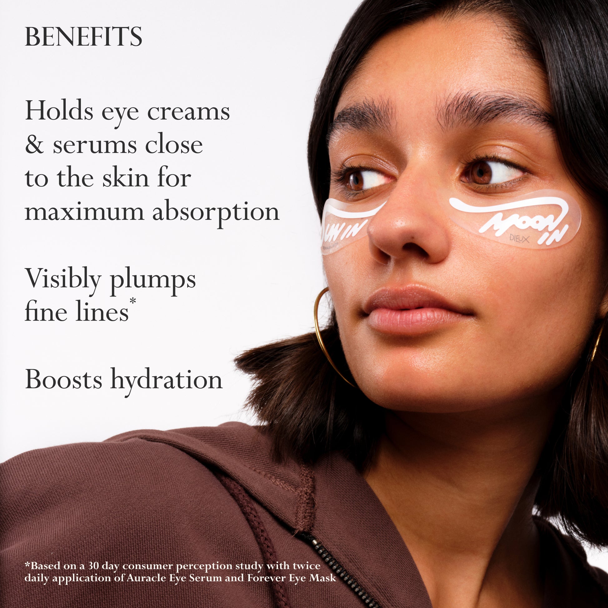 Model wearing Eckhaus Latta x Dieux Solar Return Forever Eye Mask.
Text: Benefits
- Holds eye creams & serums close to the skin for maximum absorption
- Visibly plumps fine lines*
- Boosts hydrations
*based on a 30 day consumer perception study with twice daily application of Auracle Eye Serum and Forever Eye Mask
