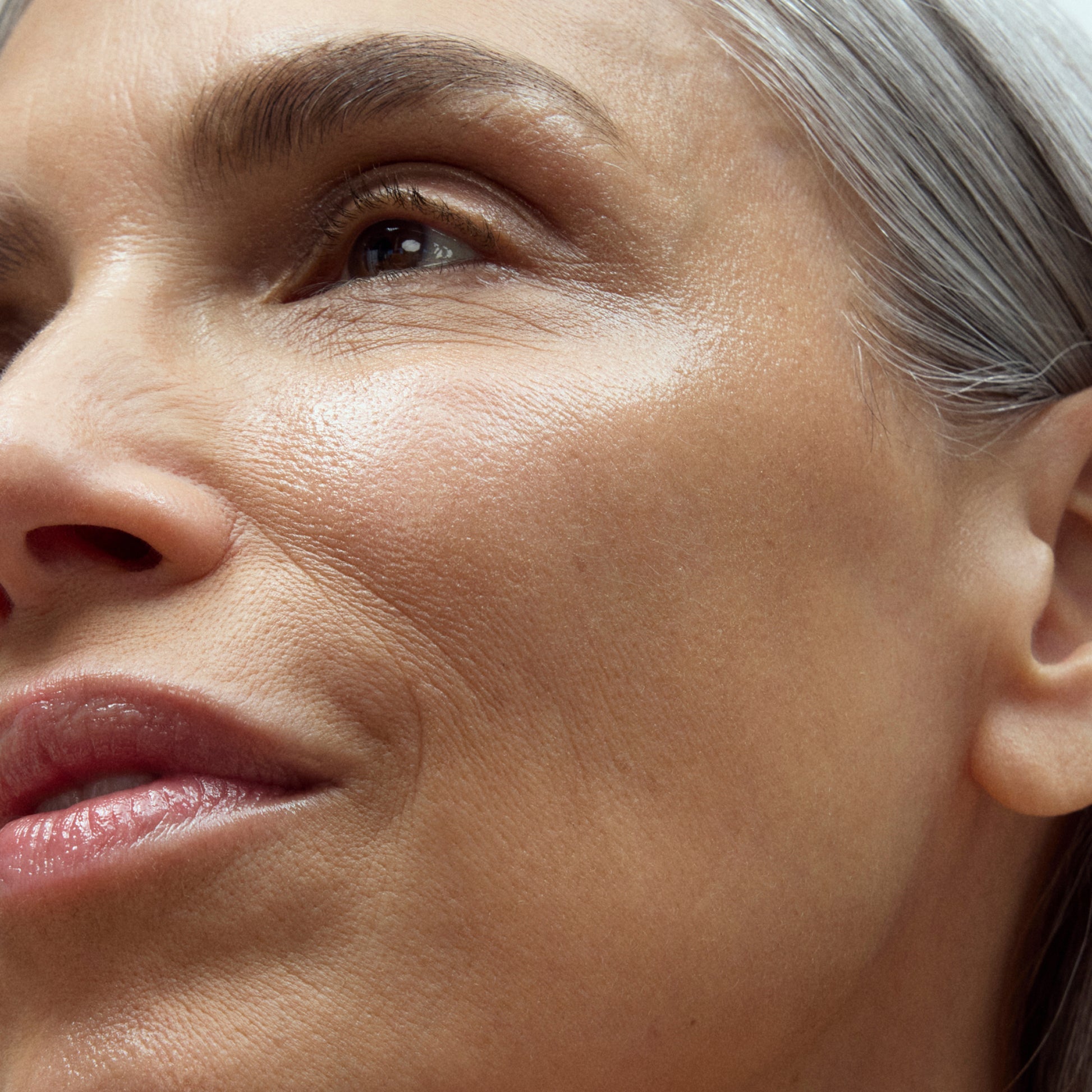 Close-up portrait with luminous skin for Deliverance serum