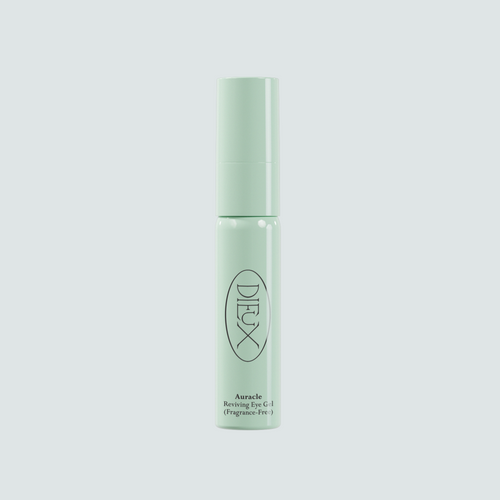 Dieux Auracle Eye Serum bottle on a pale blue background