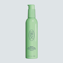 Dieux Baptism Gentle Gel Cleanser fragrance-free bottle on a pale blue background