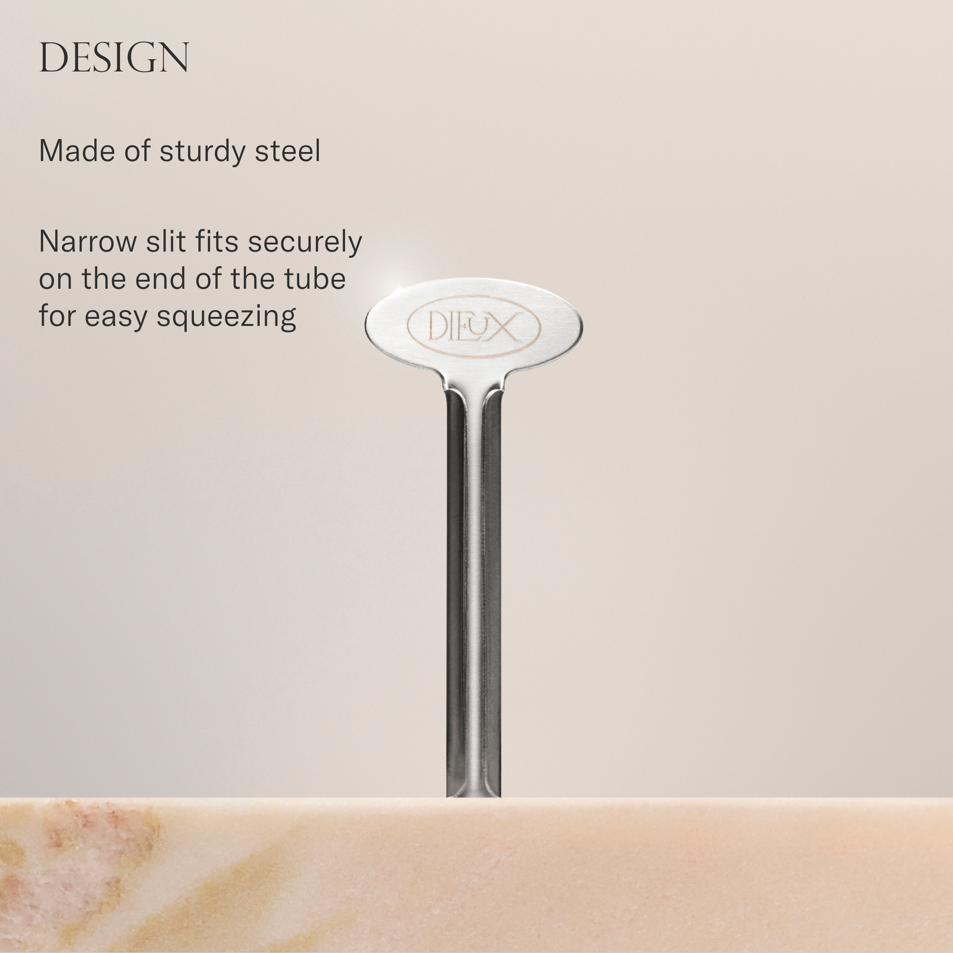 Dieux Squeeze Key on beige background with text speaking to the design and features of the tool