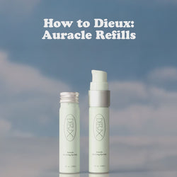 Dieux Auracle Eye Serum  on a blue and white cloud background. 

Text: How to Dieux: Auracle Refills. 